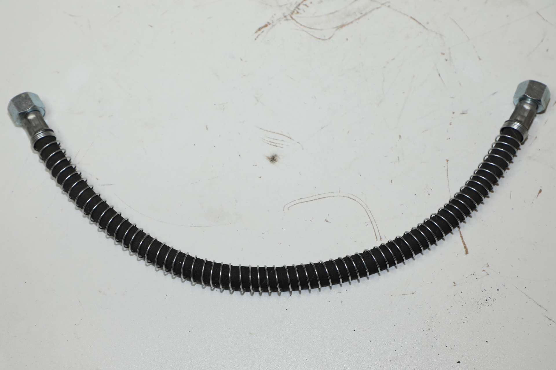 // Шланг тормозной (L= 605) гайка 27 гайка 27 тормозной    6422-3506085-01